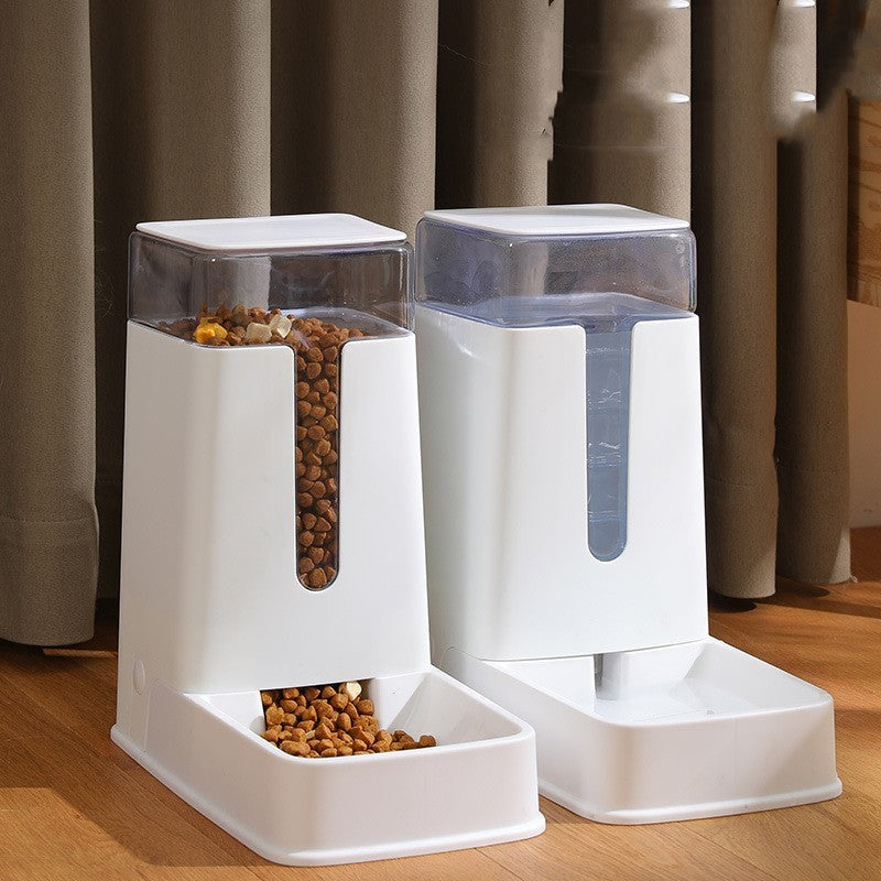 White feeder and waterer side by side, hoppers filled