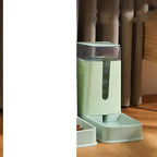 Green feeder and waterer pair seen from the front