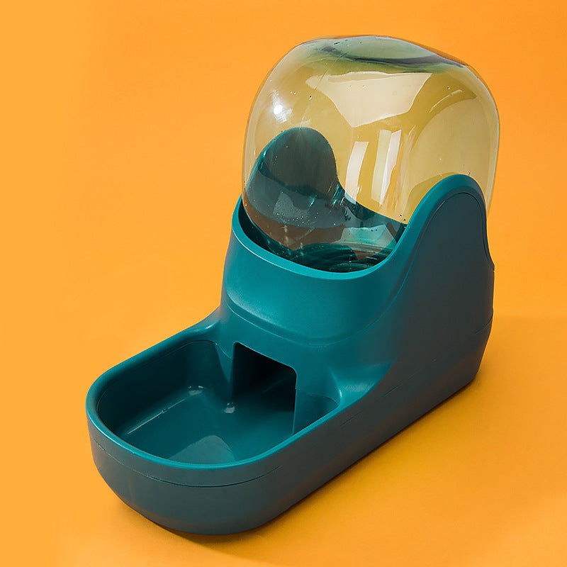 Teal waterer against an orange background