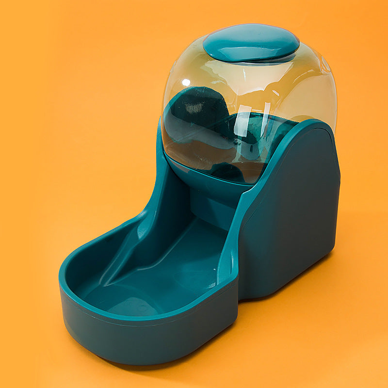 Teal feeder against an orange background