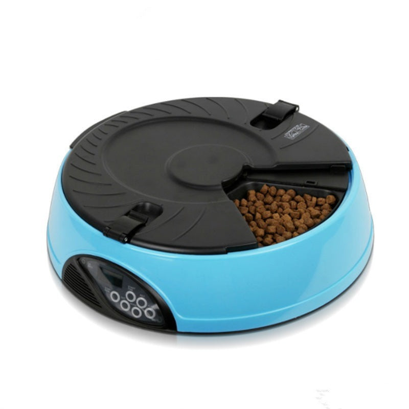Blue feeder with one compartment open showing kibble