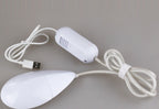 The white power adapter and its cable