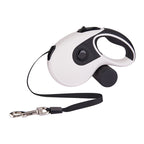 White retractable leash with black strap extended