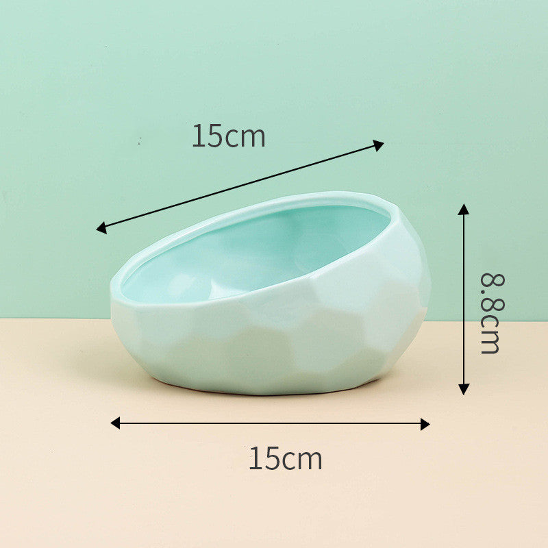 Mint green slanted ceramic bowl, side view