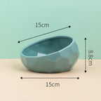 Teal slanted ceramic bowl, side view