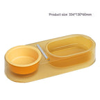 Amber translucent double bowl with a steel mixing spoon