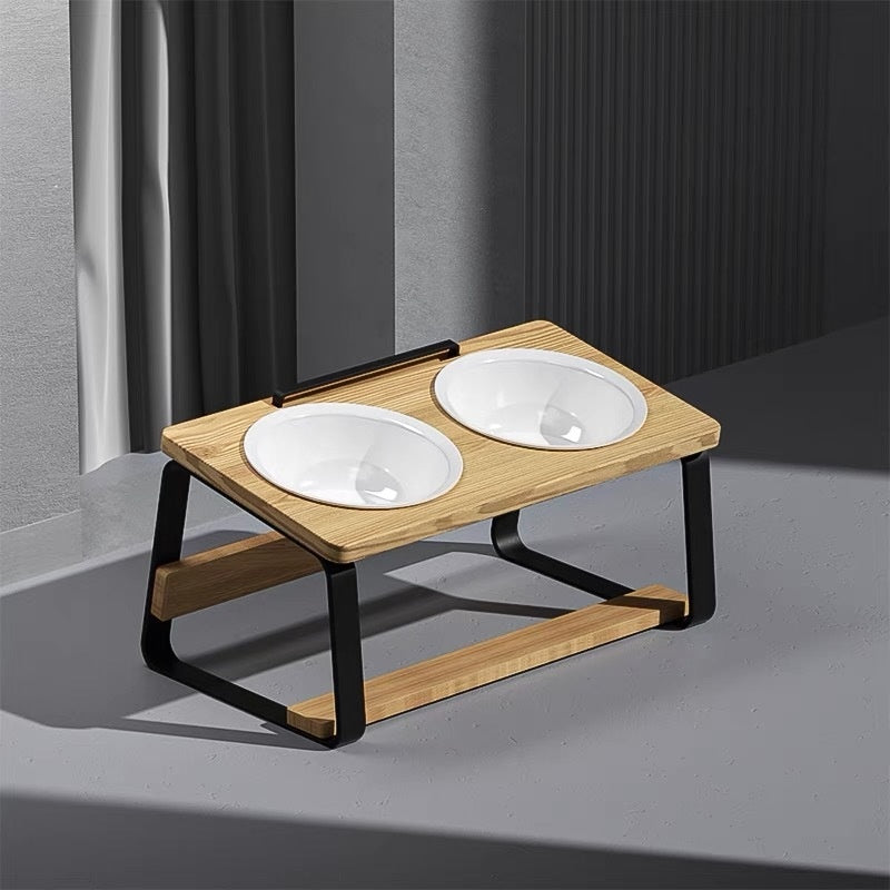 Wooden and metal stand holding two white ceramic bowls