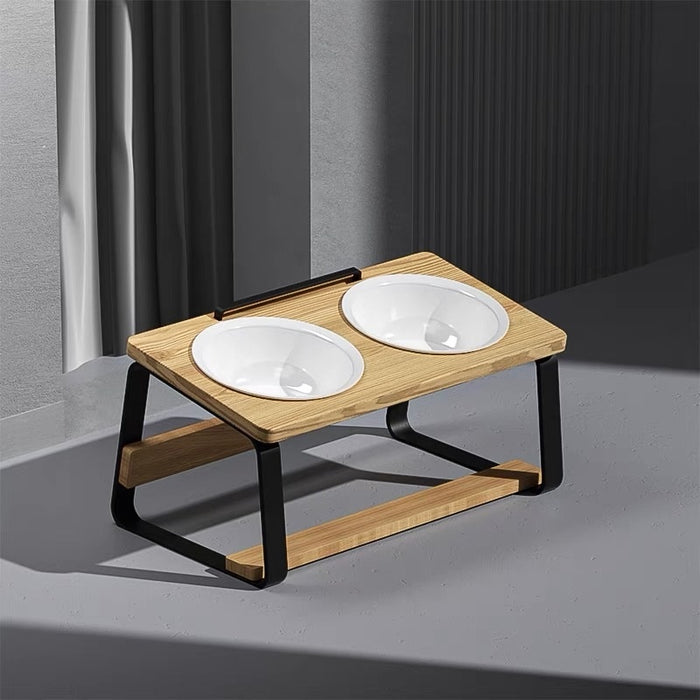 Wooden and metal stand holding two white ceramic bowls