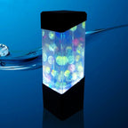Lamp lit blue against a dark blue background