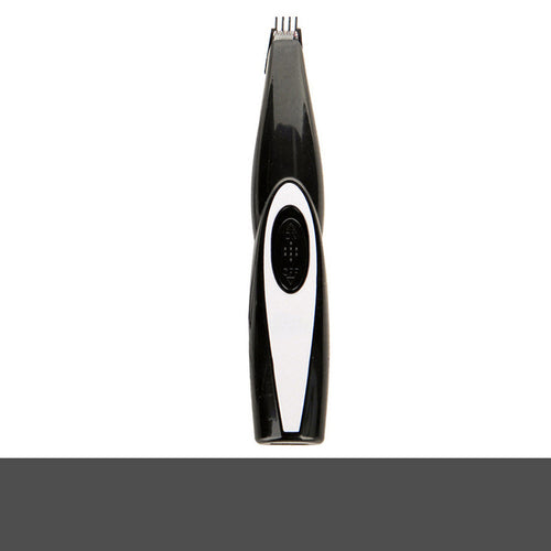 Black and white clipper standing upright on white