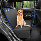 Golden retriever sitting on the hammock cover inside a car