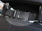 Close-up of the headrest strap buckled inside a car
