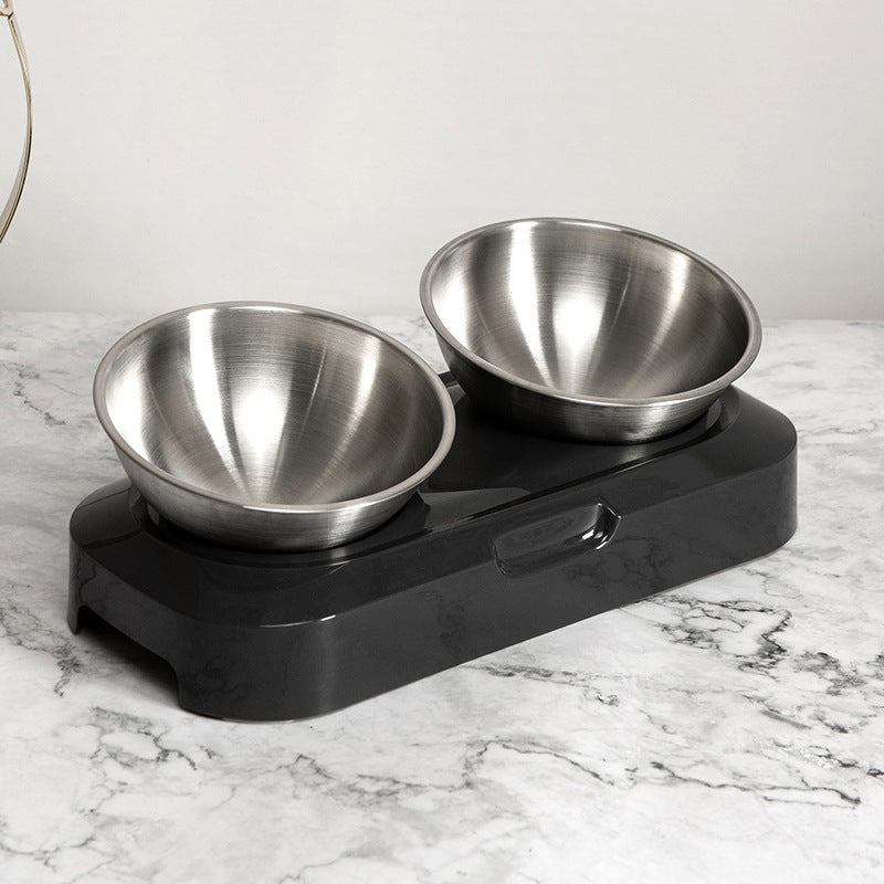Double bowl stand on a marble surface, angled view