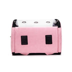 Pink carrier folded down, side view