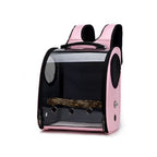 Pink carrier with a wooden perch fitted inside