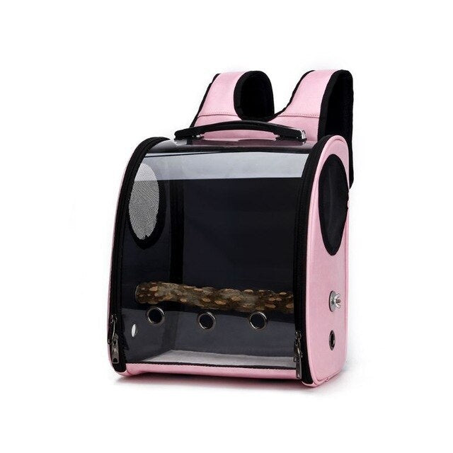 Pink carrier with a wooden perch fitted inside