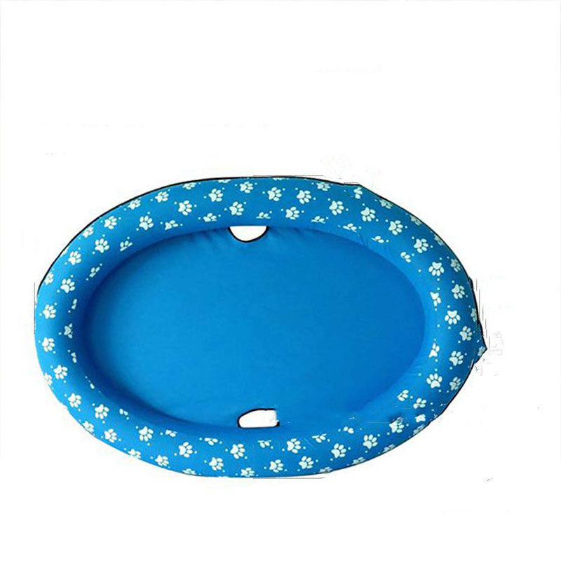 Blue float with paw print rim laid flat on white