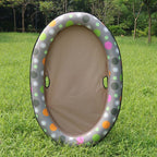 Brown float with a spotted rim standing on grass