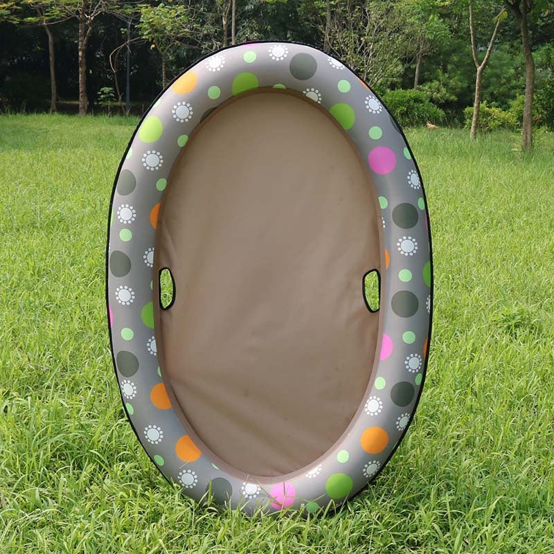 Brown float with a spotted rim standing on grass