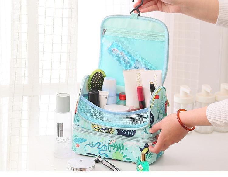 Bag opened showing bottles and brushes in the pockets