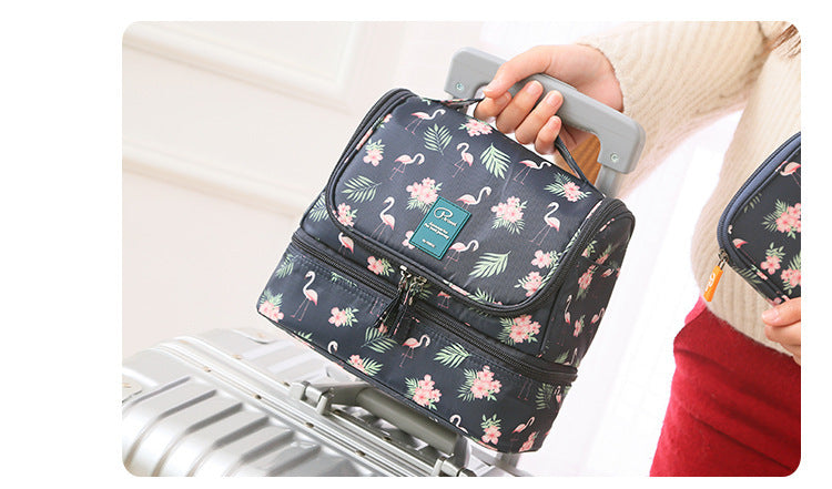 Person holding the navy floral version of the bag