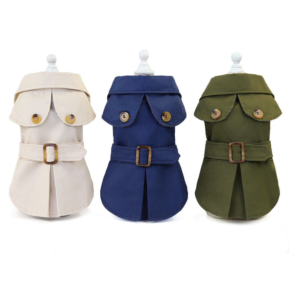 Three trench-style coats in cream, navy and olive