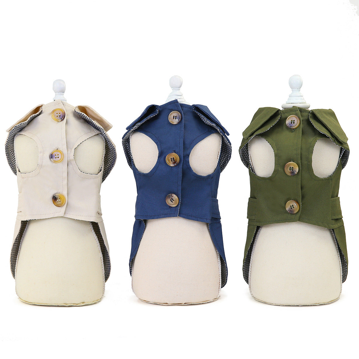 The three coats fitted on display mannequins