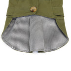 Olive coat lifted to show the checked inner lining