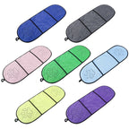 Eight folded microfibre paw towels in different colours