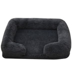 Charcoal plush sofa bed with raised bolster edge
