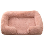 Dusty pink plush sofa bed with raised bolster edge