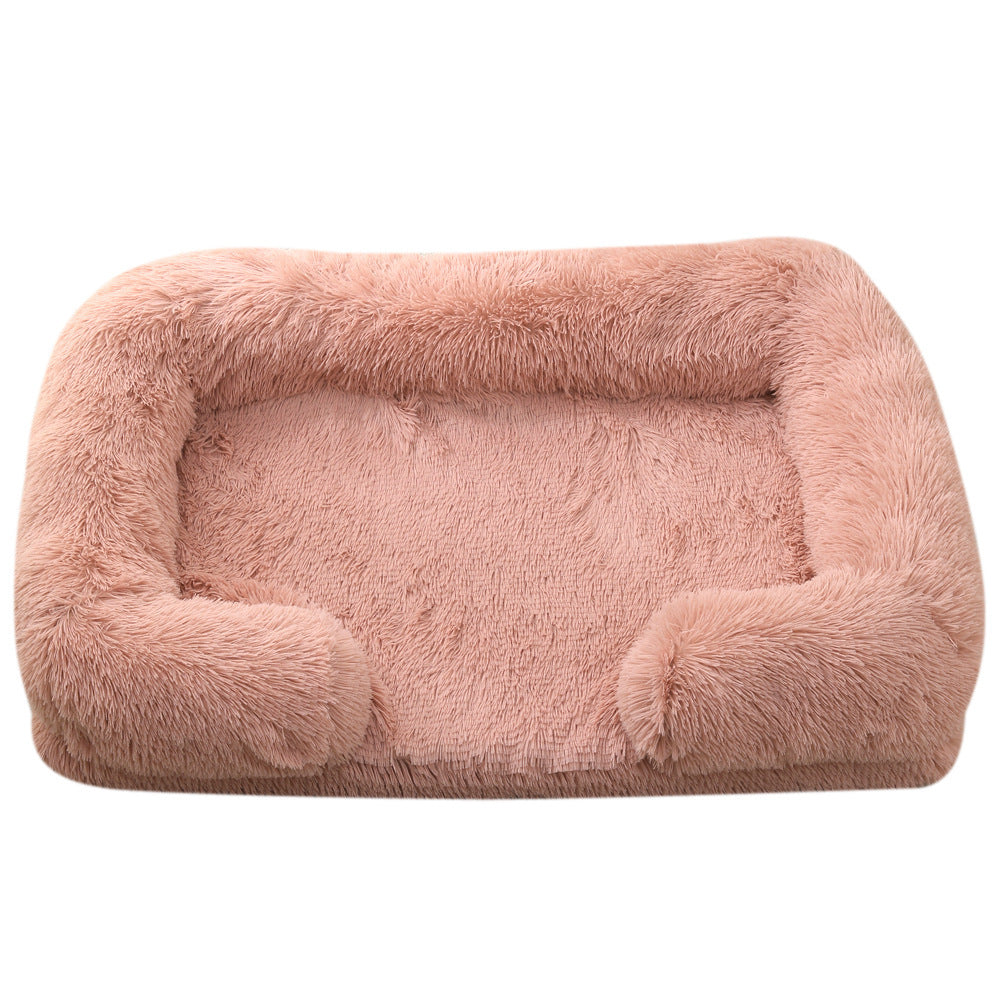 Dusty pink plush sofa bed with raised bolster edge