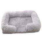 Grey plush sofa bed with raised bolster edge