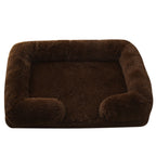 Dark brown plush sofa bed with raised bolster edge