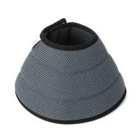 Grey recovery cone standing upright on white