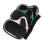 Green and pink gloves stacked one on the other