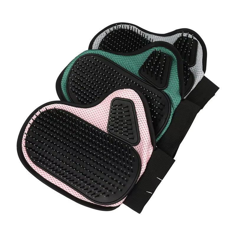 Green and pink gloves stacked one on the other