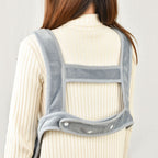 Back view showing the apron's crossed shoulder straps