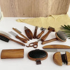 Wooden grooming tools arranged on a linen cloth