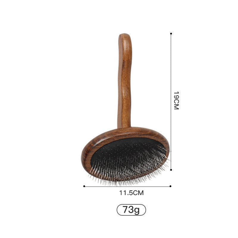 Large round slicker brush with a wooden handle
