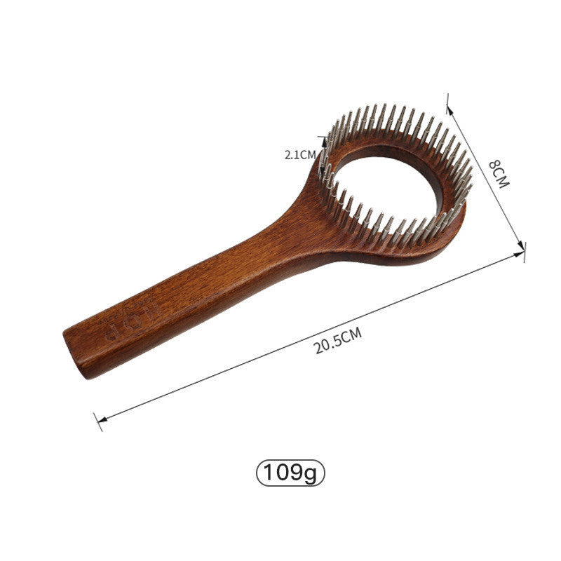 Wooden open-knot comb seen from above