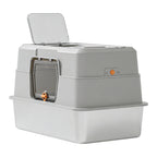 Litter box with the top lid propped open