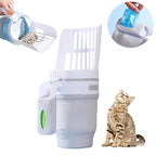 Hand holding the scoop with a bag fitted, cat sitting nearby